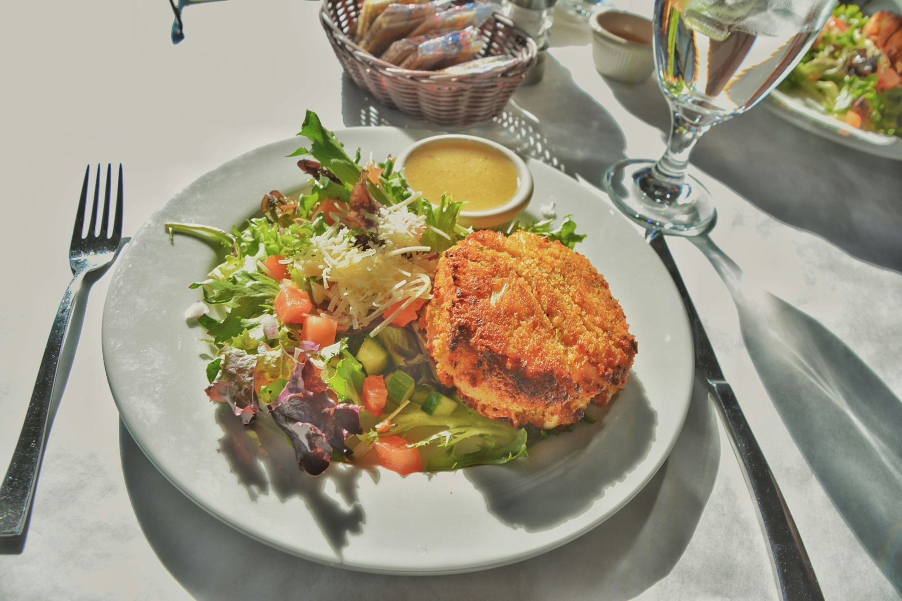 Chef Lynn Michelle's crab cake lunch plate with fresh greens